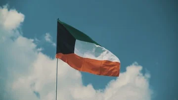 Kuwait flag 50% slow motion, sky background Stock Footage 86090347
