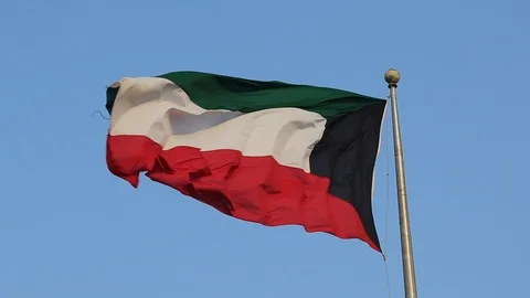Kuwait flag flutters on flagpole  Stock Footage 125151792