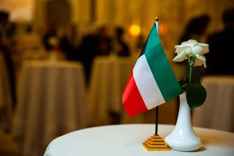 Kuwait flag on the table Stock Photos