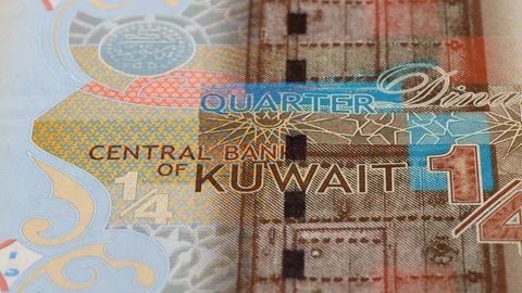 Kuwait quarter dinar banknotes tracking. Slider shot. Low angle, macro. 4K Stock Footage 125979617