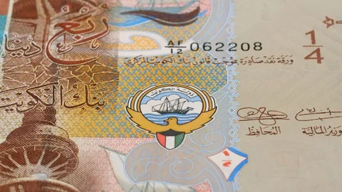 Kuwait quarter dinar notes tracking. Slider shot. Low angle, macro. 4K Video stock 125980193