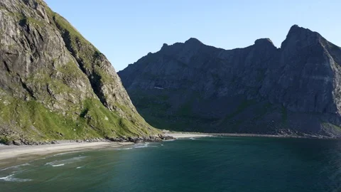 Kvalvika beach seen from the summit of Ryten, Lofoten Island, Norway 4K VIDEO Stock Footage 126150184