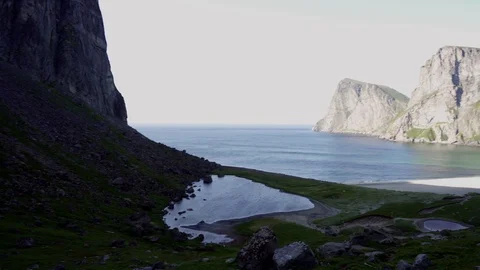 Kvalvika beach seen from the summit of Ryten, Lofoten Island, Norway 4K VIDEO Stock Footage 126151725