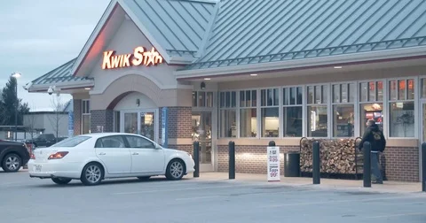 Kwik Star Store - Man Walking In - Convenience Store Stock Footage 74175630