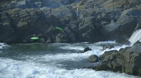 Kyakers climbing out of the rapids Video stock 12706265