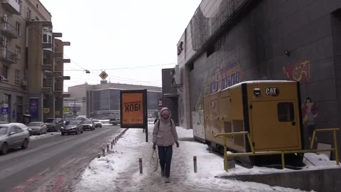 Kyiv changes habits to keep functioning without heating and at extreme temperatu Stock Footage 326802136