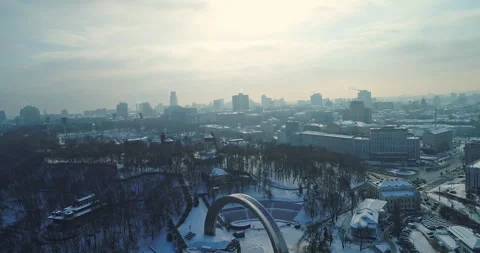 Kyiv Cityscape in Winter Drone View of Snow-Enveloped Streets and Buildings Stock Footage 259647624