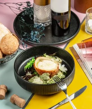 Kyiv cotlete with vegetables on the table Stock Photos