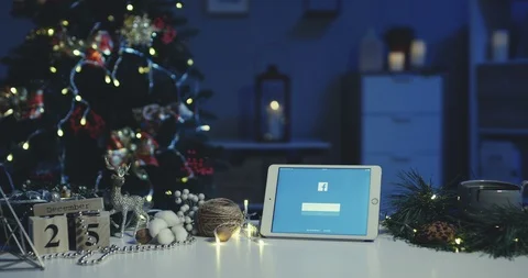Kyiv - December 2018: Close up of the horizontal white tablet computer with Stock Footage 99809715