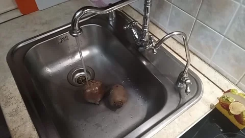 Kyiv. Raw beets in the kitchen sink Stock Footage 225122567
