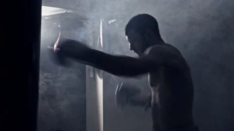 Kyiv, Ukraine - June/01/2020: A boxer training with punching bag Vídeos de archivo 132340407