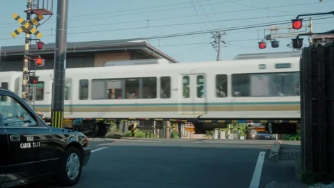 Kyoto Level Crossing Train Passing Taxi Waiting Japan Stock Footage 336315872