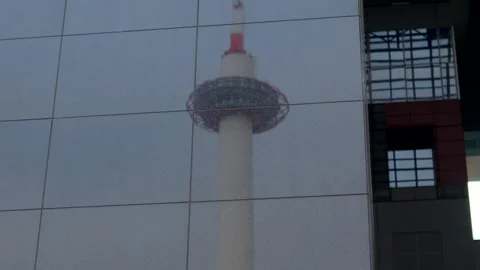 Kyoto Tower Reflection on Kyoto Station Facade in Winter, Kyoto Japan Stock Footage 333066344