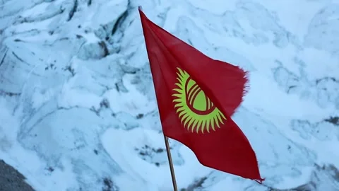 Kyrgyzstan Flag In The Mountains Stock Footage 247618017