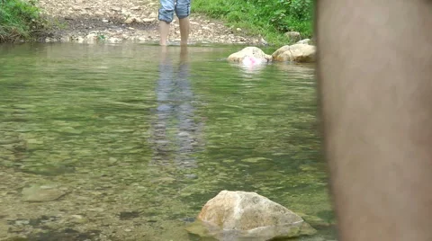 Kziv river at spring. Passage across the river. Stock Footage