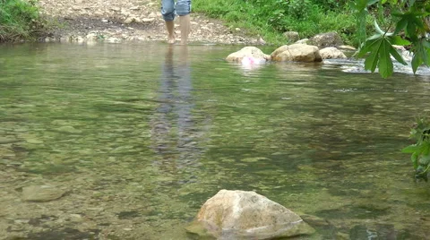Kziv river at spring. Slow motion. Passage across the river. Stock Footage