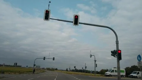 L shaped intersection with traffic lights on red Stock Photos