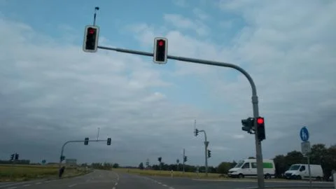 L shaped intersection with traffic lights on red Stock Photos