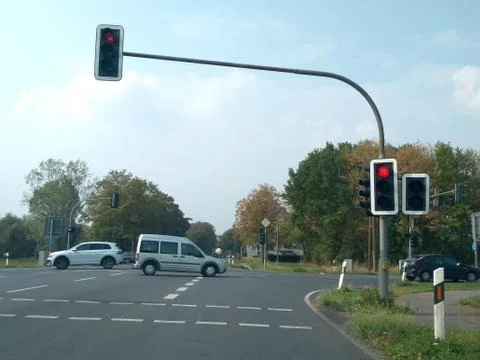 L shaped intersection with traffic lights on red Stock Photos