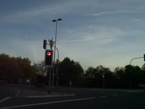 L shaped intersection with traffic lights on red Stock Photos
