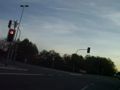 L shaped intersection with traffic lights on red Stock Photos