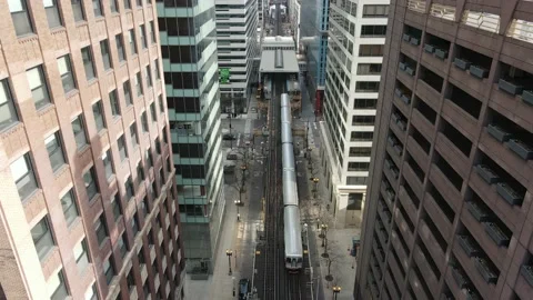 L train Traveling through the loop downtown Chicago aerial Stock Footage 147162829