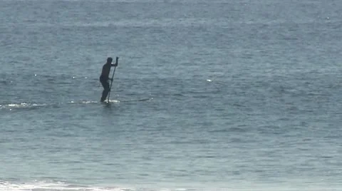 LA-0034 PADDLING OFF THE BEACH Stock Footage 10699547