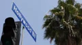 LA American Crosswalk Pedestrians Hollywood Sign Traffic Signal Street Avenue US HD Footage