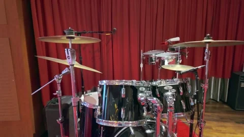 LA, CA, USA: March 20, 2026 - Professional black drum kit stage setup Stock-Footage 331184618
