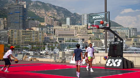 La Condamine, Monaco - August 25, 2024: Boys playing basketball at the Rainier Stock Footage 306366697