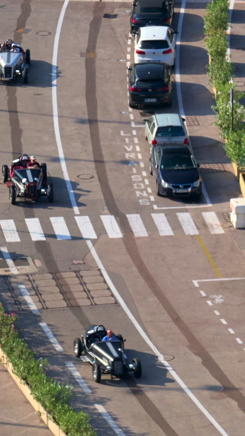 La Condamine, Monaco - August 25, 2024: Aerial view of cars moving on the Stock Footage 306392419