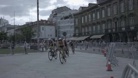 La Coruna, Spain - 18 June 2022 : Spanish Thriathlon Championship. Cyclists on Stock Footage 213611004