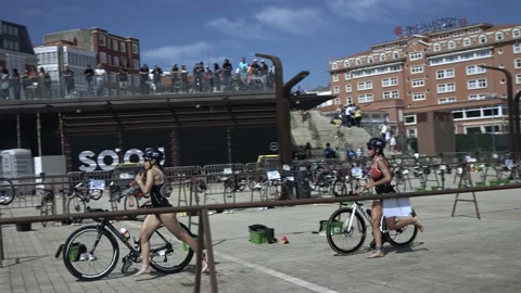 La Coruna, Spain - 18 June 2022 : Spanish Thriathlon Championship. A team of Stock Footage 213612715
