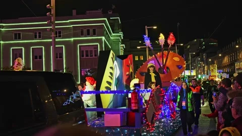 La Coruna, Spain - 5 Jan 2023: Feast of the Three Kings. A colorful cart with Stock Footage 229503090