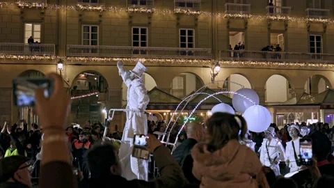 La Coruna, Spain - 5 Jan 2023: Feast of the Three Kings. Men in white suits at Video stock 229504002