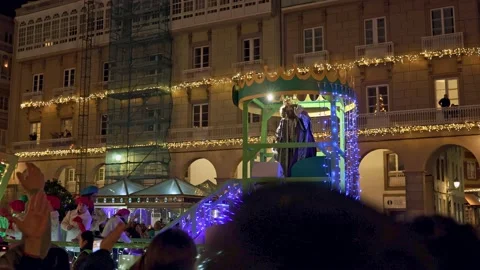 La Coruna, Spain - 5 Jan 2023: Feast of the Three Kings. The king throws candy Stock Footage 229504127
