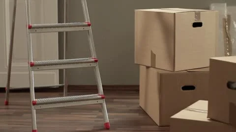 LA, CU, PAN of moving boxes and supplies Stock Footage 10702610