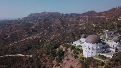 LA: Drone shot over Griffith Observatory looking towards the Hollywood Stock Footage 154226579