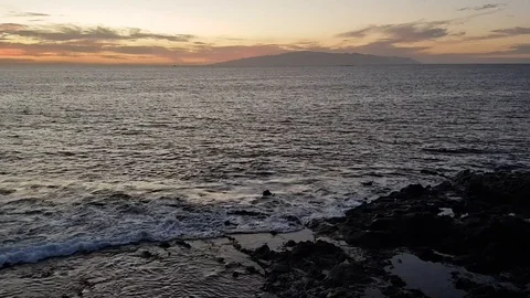 La Gomera sunset and lapping waves from Tenerife Stock Footage 109412996