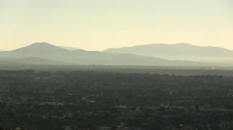 La jolla day high angle lookout point trees houses and mountains 2 Stock Footage 44539238