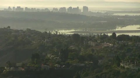 La jolla day high angle lookout point  downtown la on the horizon trees house Stock Footage 44547686
