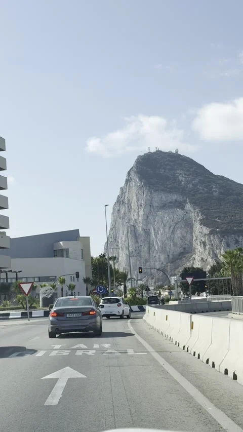 La Linea de la Concepcion drive with Rock of Gibraltar ahead Stock Footage 333189846