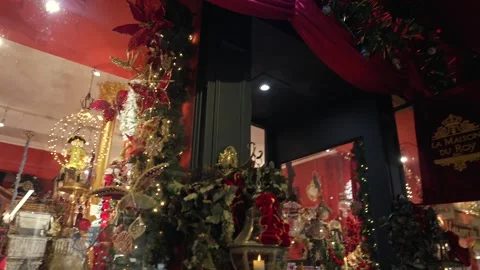 La Maison du Roy Paris Dec 2 2023 with Christmas lights poinsettias and decor Stock Footage 314891914