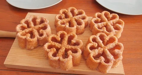 La Mancha Flower Shape Bread Coated With Sugar On Board. - close up Stock Footage 203938312