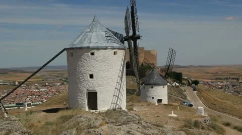 La Mancha windmills with castle Stock-Footage 10897316