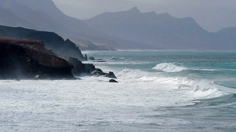 La Pared, waves hitting the rocks at the coast, Fuerteventura Stock Footage 104800152