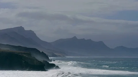 La Pared, waves hitting the rocks at the coast, Fuerteventura Stock Footage 107229609