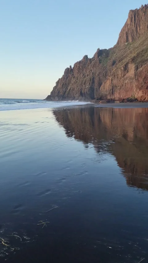 La playa de las Gaviotas, popular nudist beach with black volcanic sand in Tener Stock-Footage 307632765