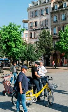 La Poste manger interviewed in city center during exposition of green posta.. Stock Photos