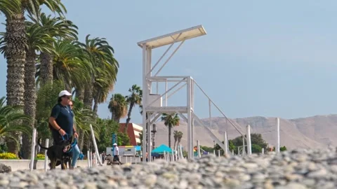 La Punta, Callao Peru, 2023. Beach guard tower minimal with a Rescue. A wooden Stock Footage 248517834
